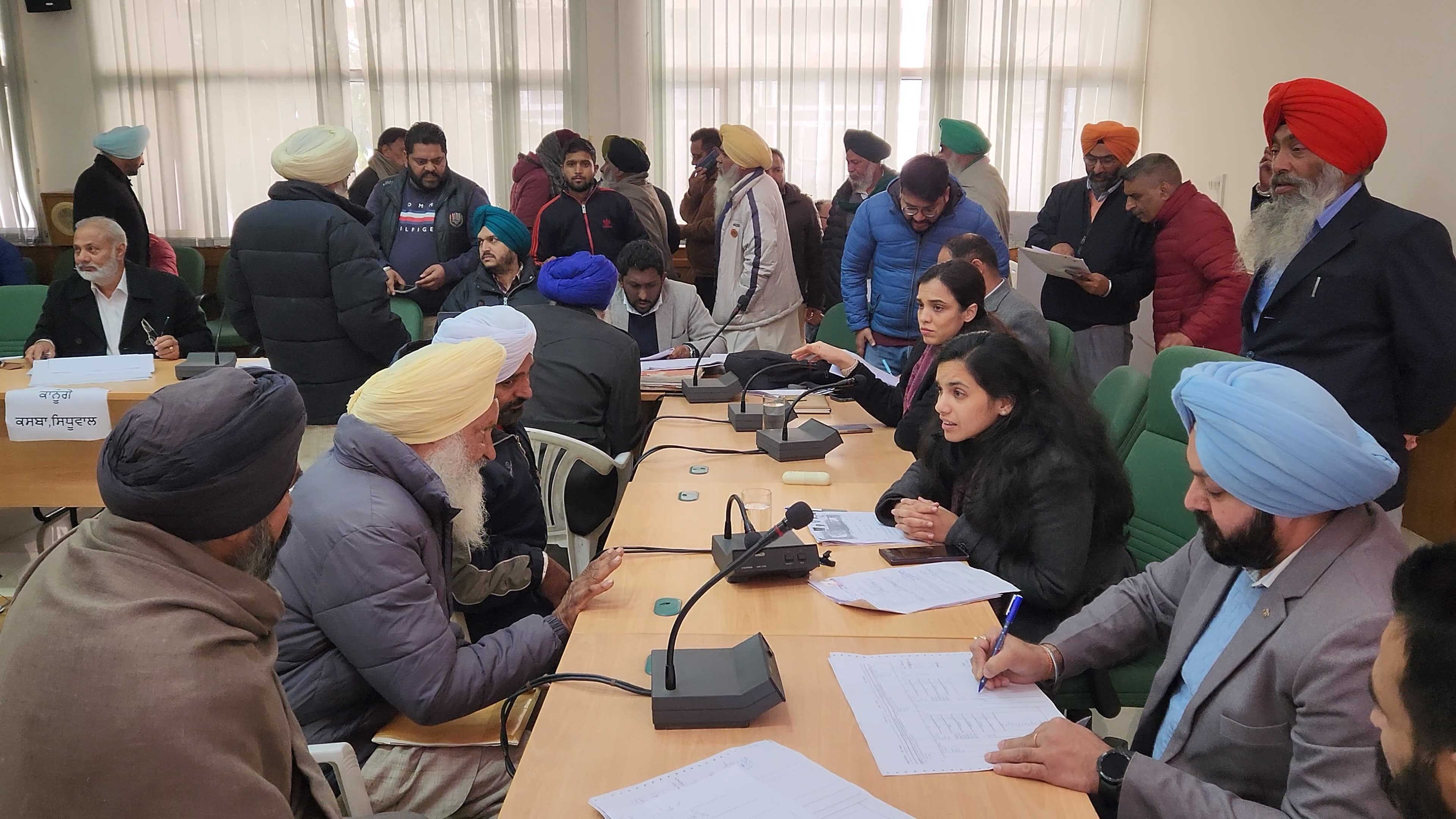 People happy with the settlement of pending transfers thanked the government to the Deputy Commissioner